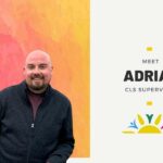 Pink and yellow chalk-like background behind picture of man wearing black. The words "Meet Adrian CLS Supervisor" on the right side with two yellow rectangles on the top and bottom of the text. Sunbeam Community Services yellow sun with pink and blue accents logo at the bottom of the page on right side.